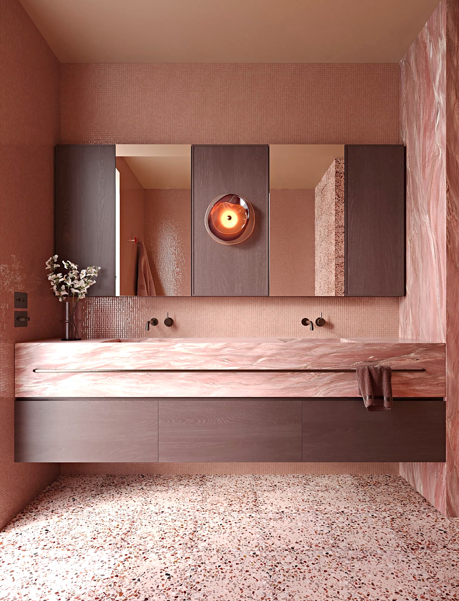 Bathroom vanity in Flamant quartzite with blush mosaic walls and terrazzo floor