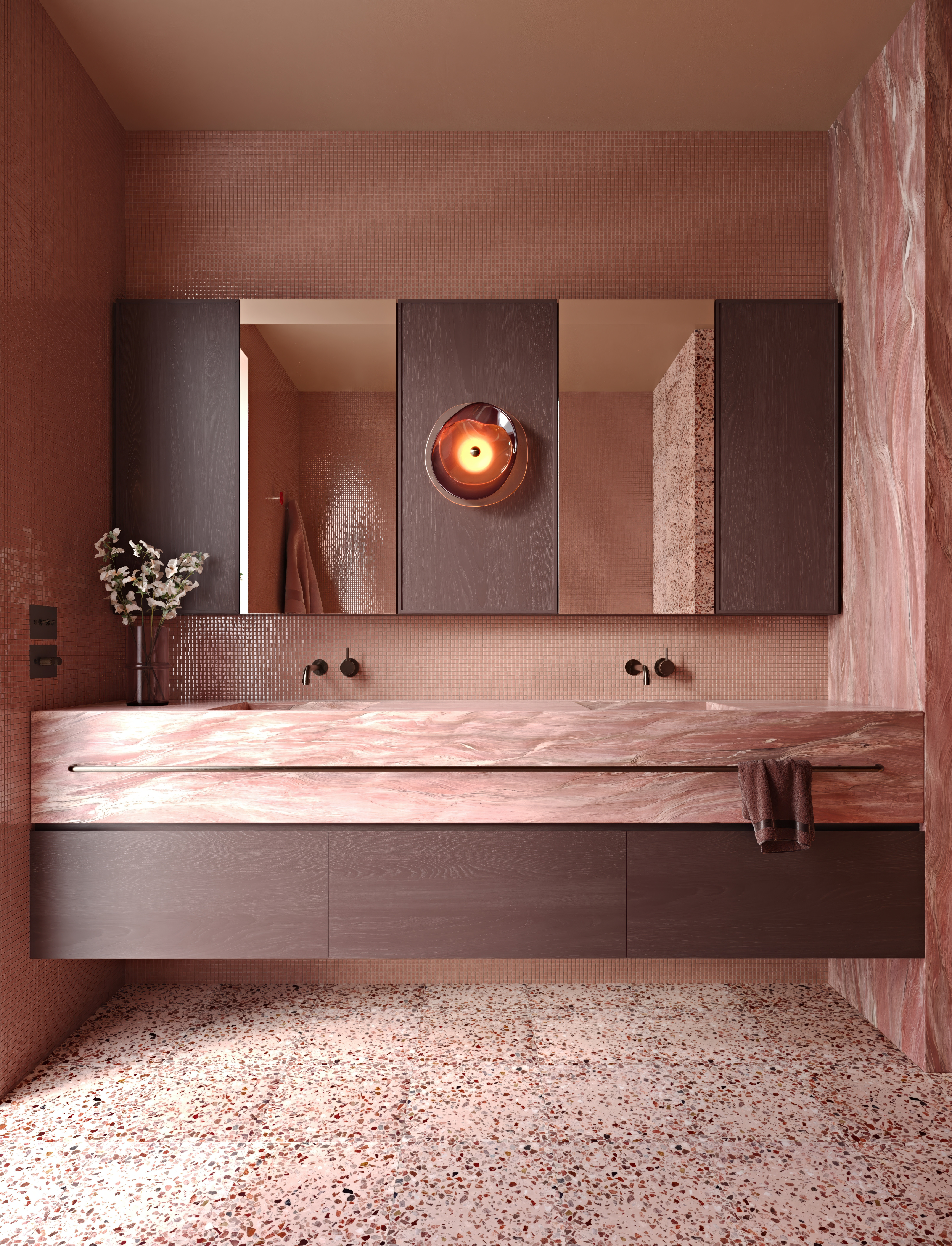 A main bathroom in Flamant quartzite, blush mosaic and terrazzo.